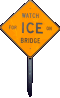 Sign: Watch for ice on bridge - bridge freezes before road - bridge may be icy