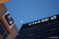 Moon and bank buildings