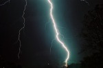 Lightning hits tree and house