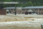 Flooded road and apartment complex