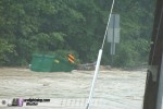 Floating dumpster in flood