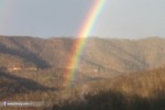 December double rainbow and mountains