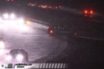 Car slides off of icy Interstate