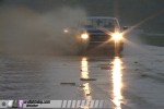 Truck hydroplanes on flooded road