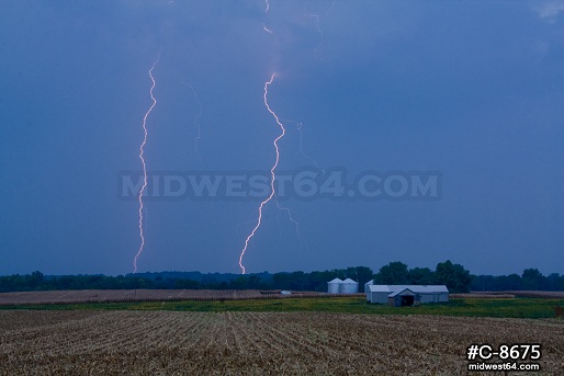 Daylight lightning over farm