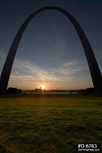 Gateway arch sunrise and lawn