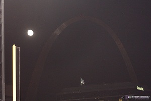 Moon rising behind Arch