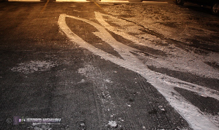 Reverse tire tracks in snow