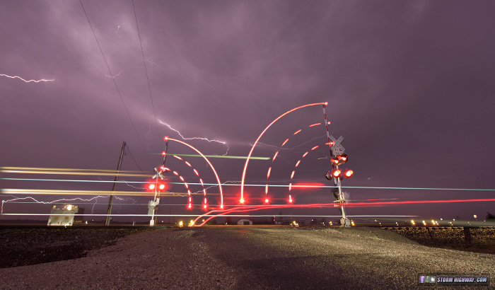Lightning over railroad crossing at Albers, IL