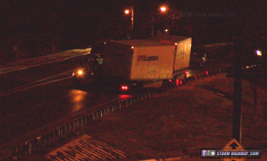 Tractor-trailer jackknifing on ice in St. Louis