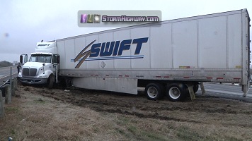 Tractor trailer jackknifes on icy bridge, pickup truck crash in Texas