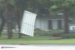 Awnings rip from a building