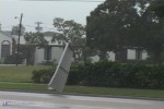 Awnings rip from a building