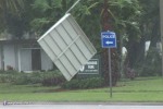 Awnings rip from a building