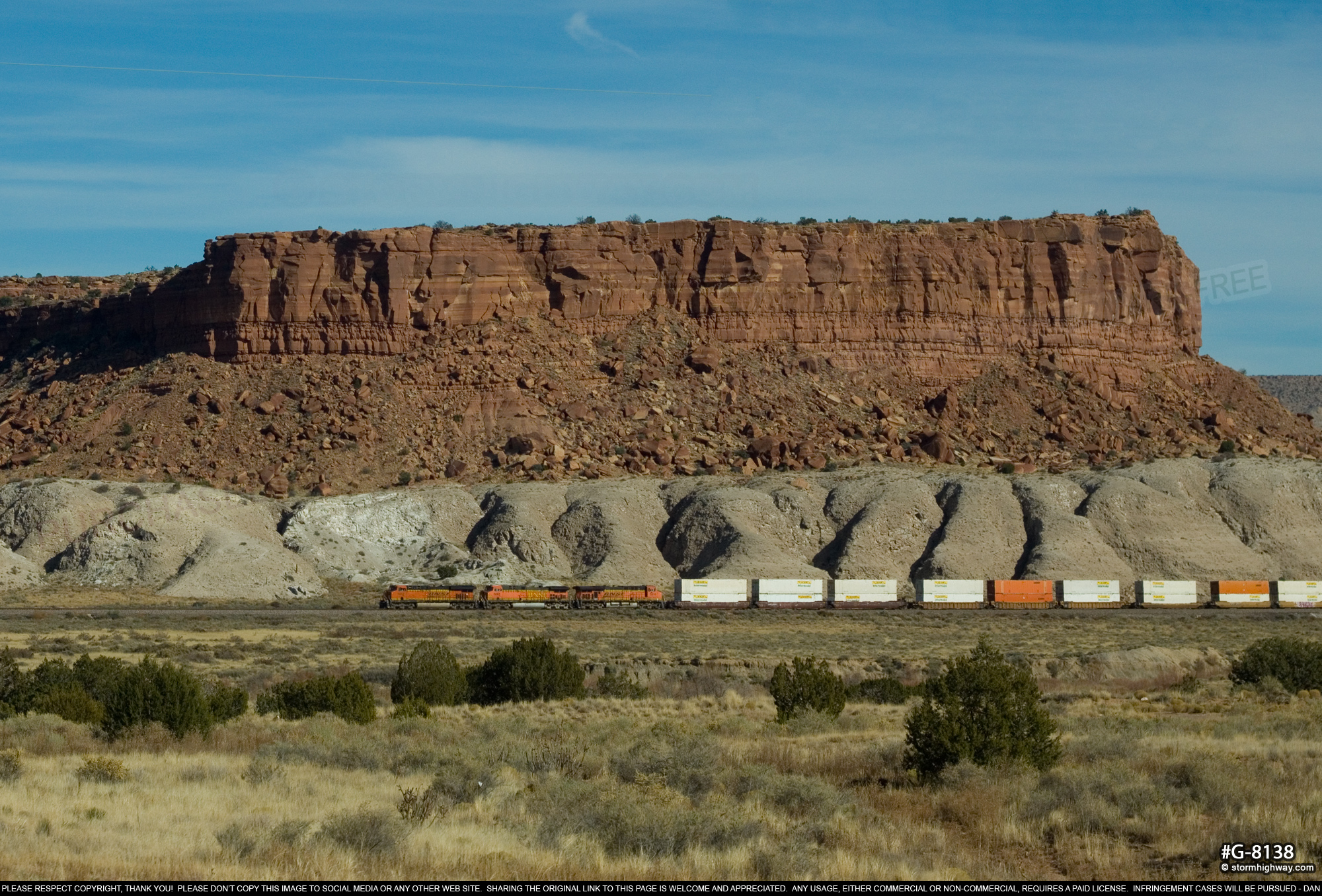 BNSF double-stack track in front of a mesa near the Tohajiilee reservation in New Mexico