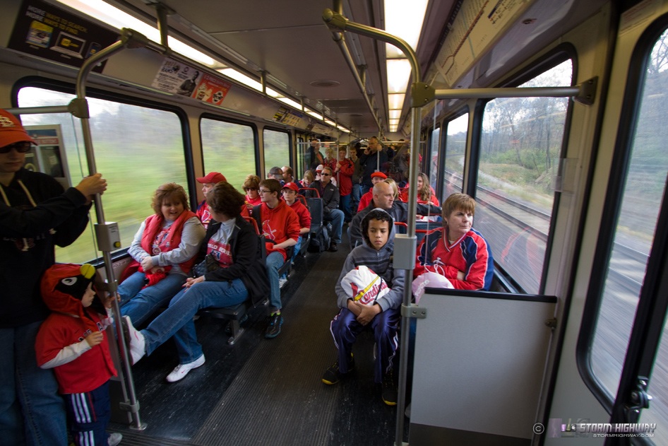 Fans riding Metrolink train