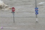 Waves and flooded causeway