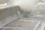 Waves and flooded causeway