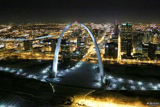 Aerial photo of the Gateway Arch and St. Louis at night
