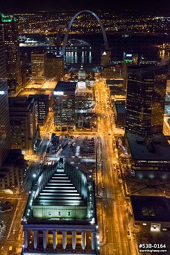 Aerial photo of downtown St. Louis and the Gateway Arch at night