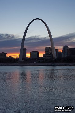 Riverfront sunset with the Gateway Arch in St. Louis..