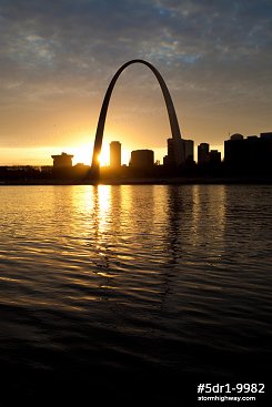 Riverfront sunset with the Gateway Arch in St. Louis.