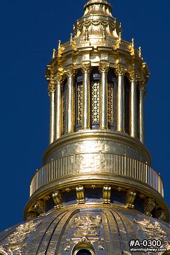 WV State Capitol gold dome close-up and blue sky, vertical shot