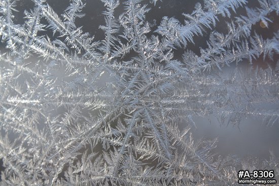 Frost on a window on a cold winter morning