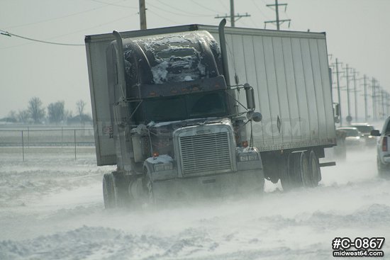 Tractor-trailer stuck in snow 