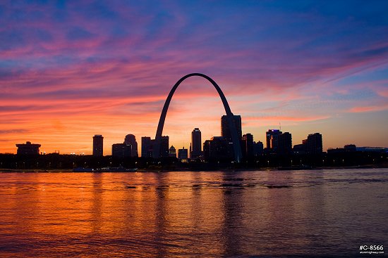 Sunset colors over the Gateway Arch in and downtown St. Louis, MO