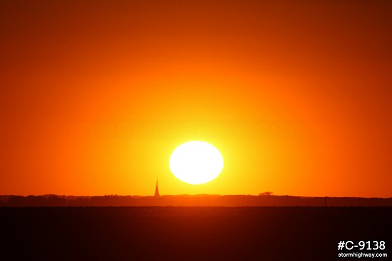 Setting sun over Illinois prairie