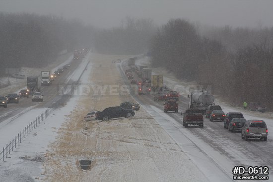 Numerous accidents on an icy interstate highway