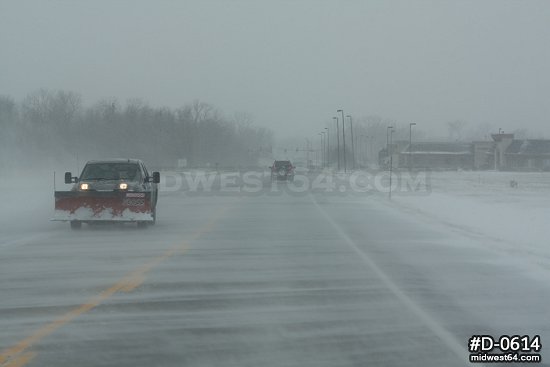 Blowing snow across highway