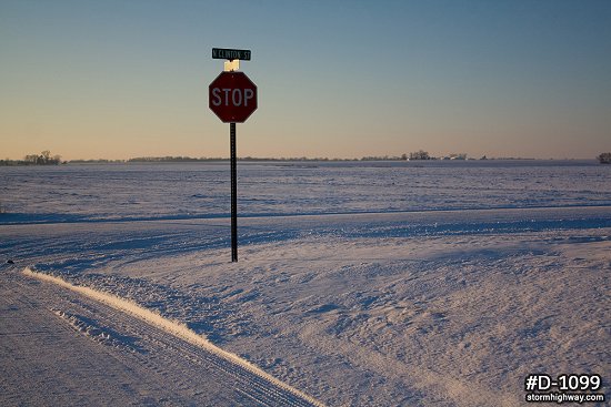 Prairie snow and stop sign