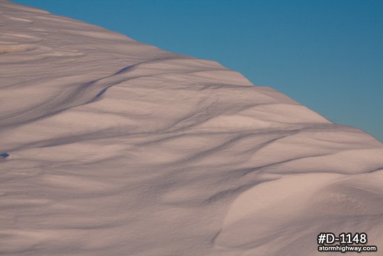 Snowdrift and blue sky