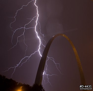 Lightning strike over the Gateway Arch in St. Louis, MO during a nighttime storm