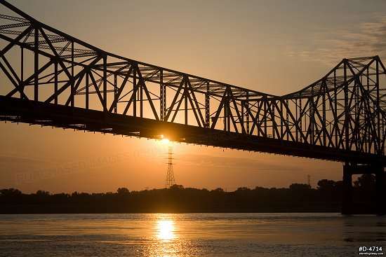 Sunrise glow on the Martin Luther King Bridge Bridge over the Mississippi River in St. Louis