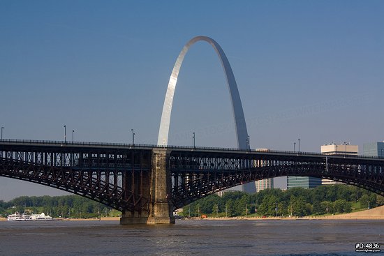 Gateway Arch with Eads Bridge and Metrolink train in St. Louis