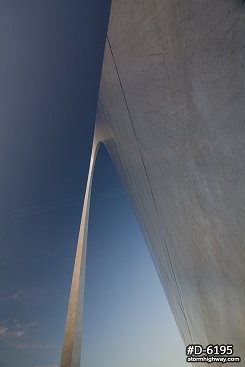 Blue sky over a close-up view of the Gateway Arch on a late summer evening in St. Louis