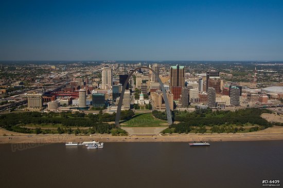 Aerial photo of downtown St. Louis and the Gateway Arch on a sunny, blue-sky day