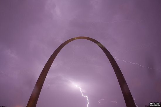 Lightning behind the Gateway Arch at night