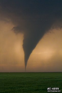 Tornado over the prairie at sunset near Rozel, Kansas