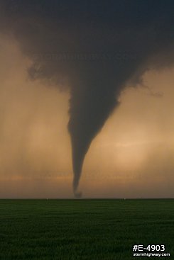 Tall cone tornado at sunset II