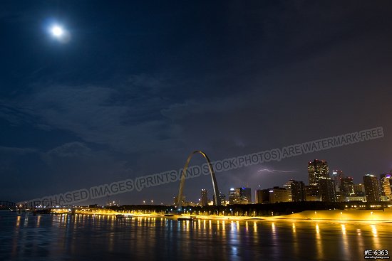 Lightning and full moon over St. Louis at night