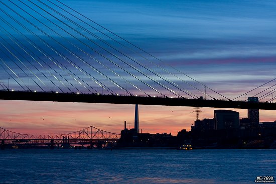 The Stan Musial Veterans Memorial Bridge nearing completion at sunset in St. Louis