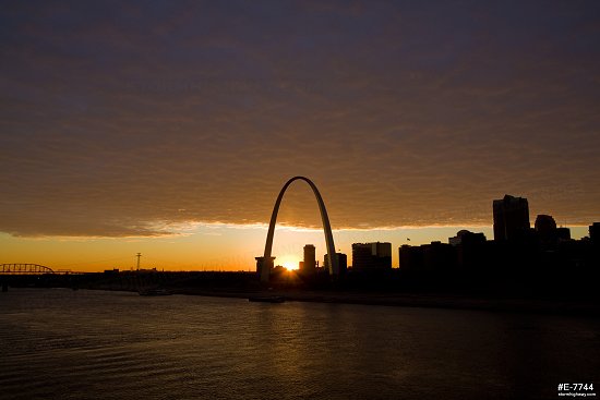 Colorful Christmas Eve sunset over the Gateway Arch and downtown St. Louis
