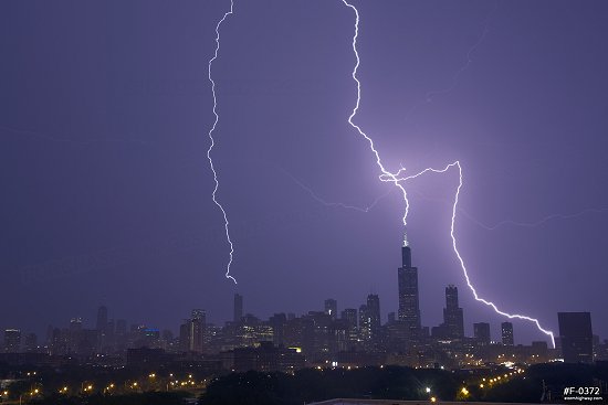 Lightning strikes the Sears (Willis) and Trump Towers in Chicago, Illinois