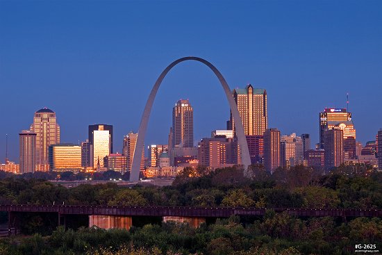 Sunrise illuminates the Gateway Arch and downtown St. Louis, MO