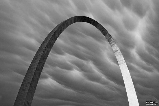 Mammatus clouds over the Gateway Arch during severe weather, black and white