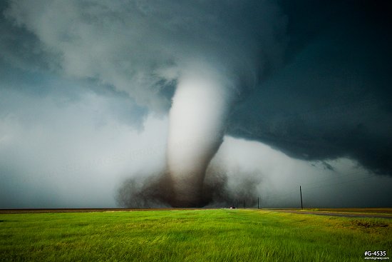 Dodge City white stovepipe tornado over green field